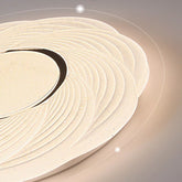 Minimalist round LED ceiling fixture with white light